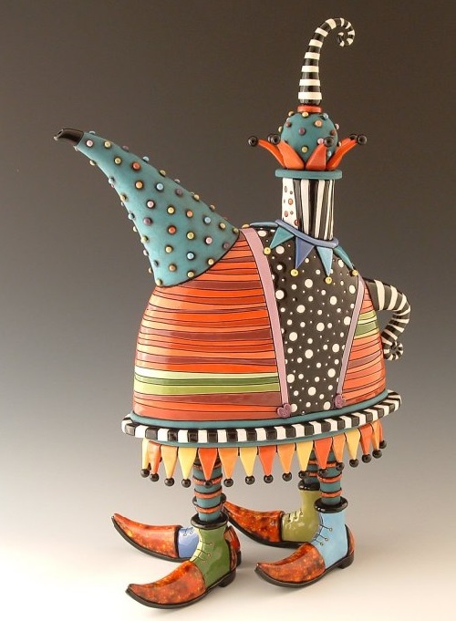 Beautiful hand made teapot, carved and painted with glaze and under-glaze. Artwork by ceramic artist Natalya Sots